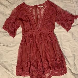 Fun, Lace romper perfect for date night, summer beach days and festivals.
